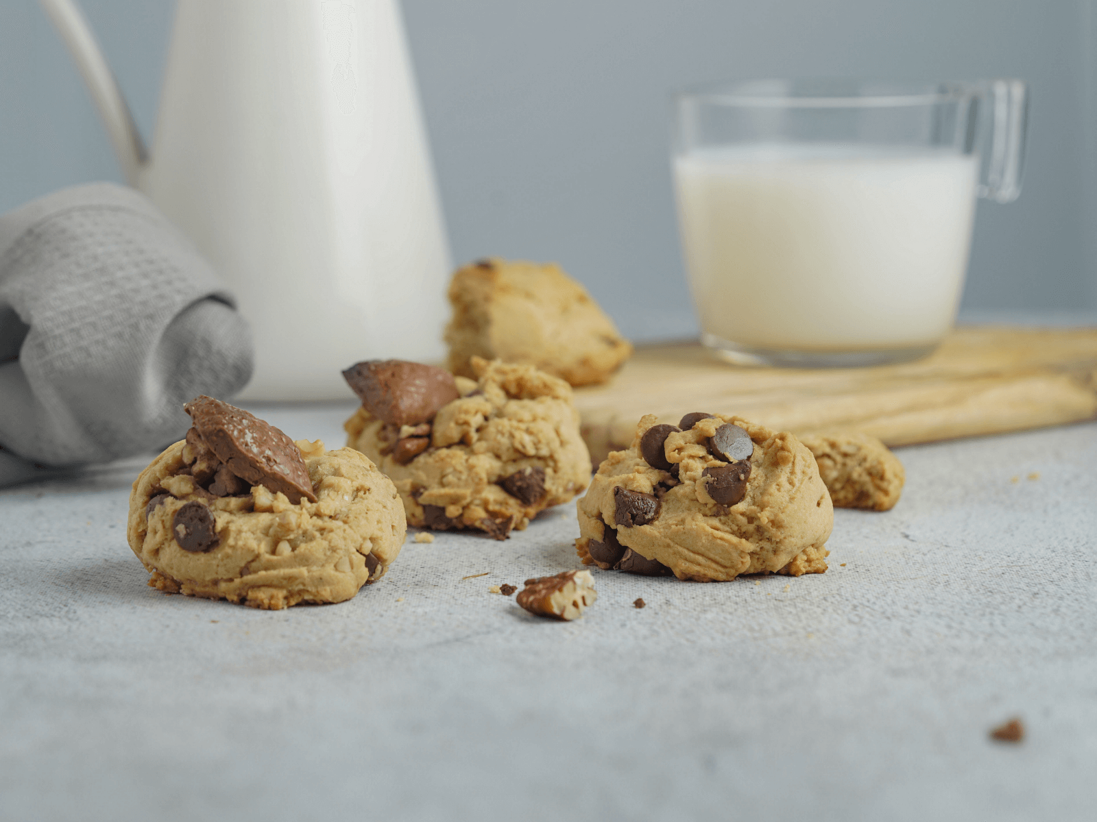 chocolate chip cookies and milk on the background